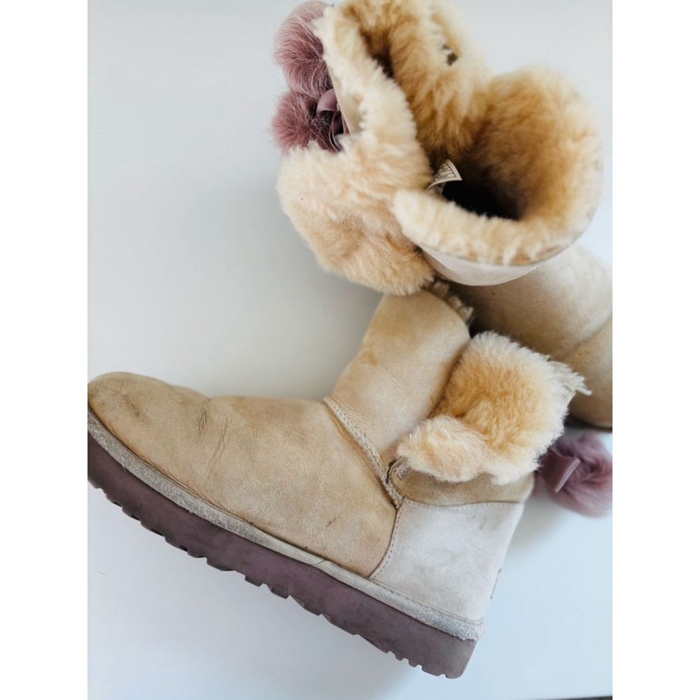 UGG Beige Sheepskin Winter Boots with Pink Pom Poms